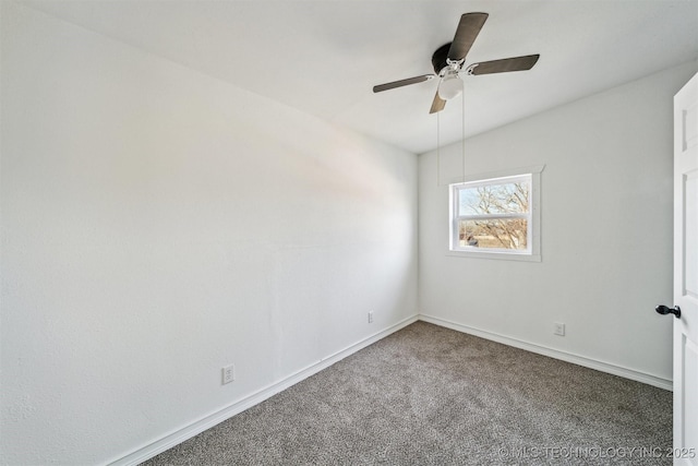 carpeted empty room featuring ceiling fan