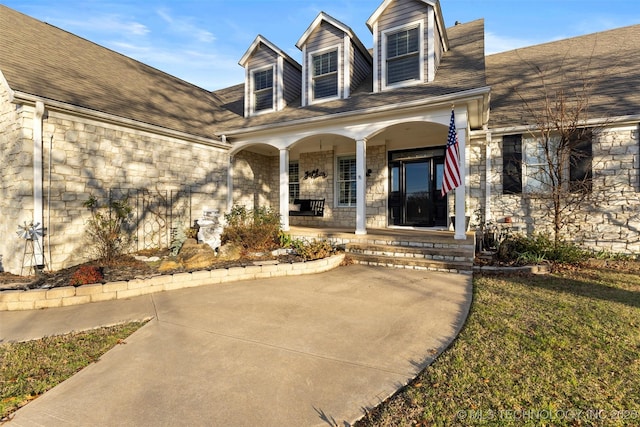 entrance to property with covered porch