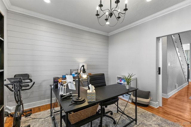 office area with hardwood / wood-style floors, a notable chandelier, and crown molding