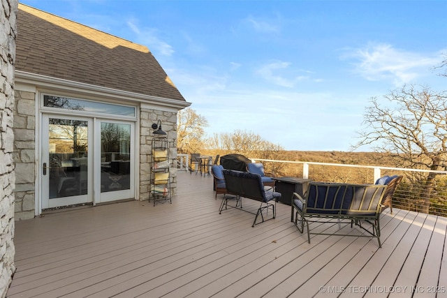 deck featuring an outdoor hangout area