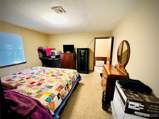 bedroom featuring a textured ceiling