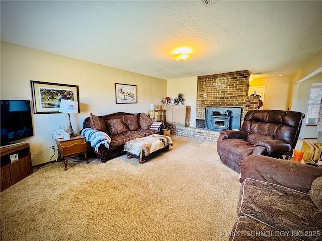 carpeted living room featuring a wood stove and a textured ceiling