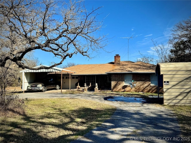 rear view of house with a lawn