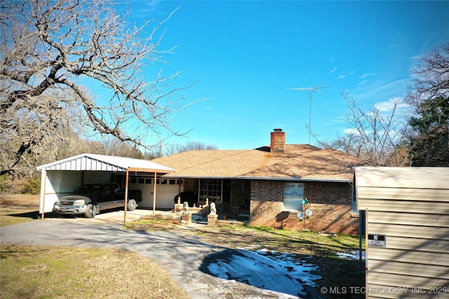 view of front of house with a carport