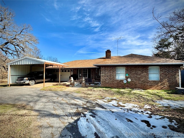 ranch-style home featuring a carport