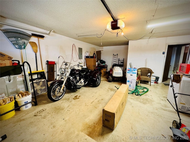 garage featuring a garage door opener and electric panel