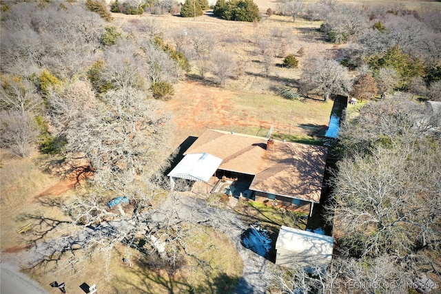 birds eye view of property featuring a rural view