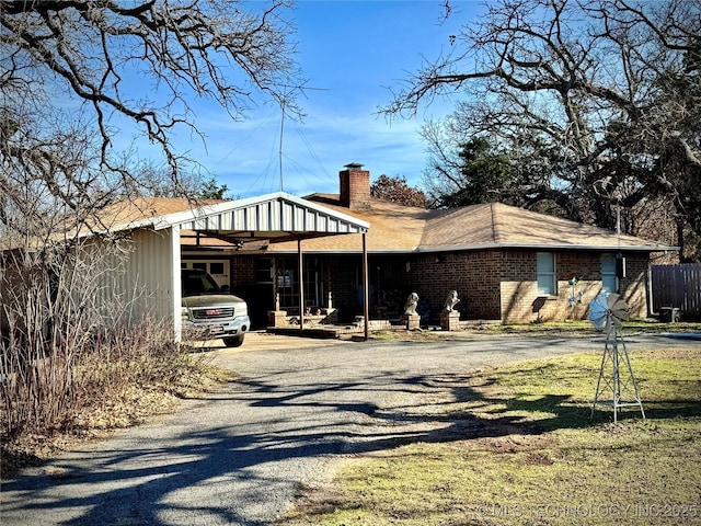 exterior space featuring a carport