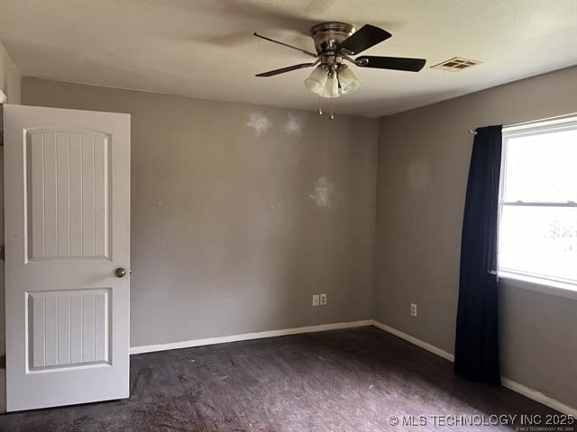 empty room with ceiling fan