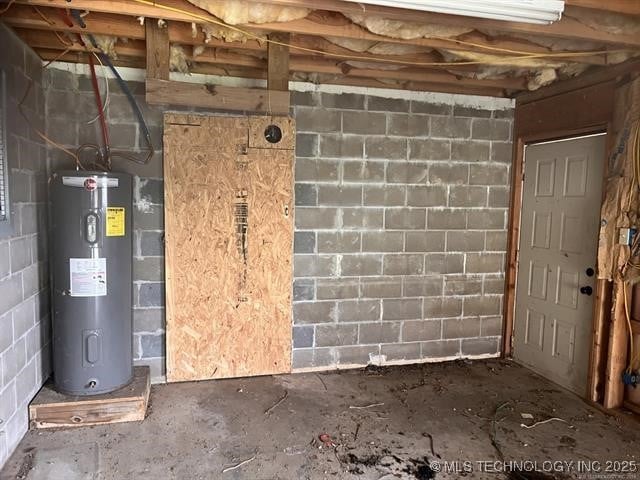 basement featuring water heater