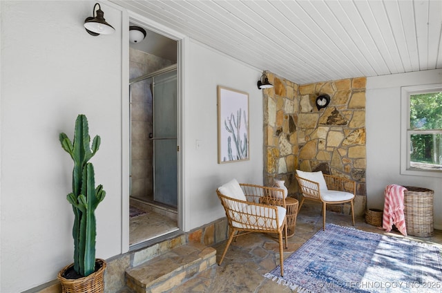 sitting room featuring wood ceiling