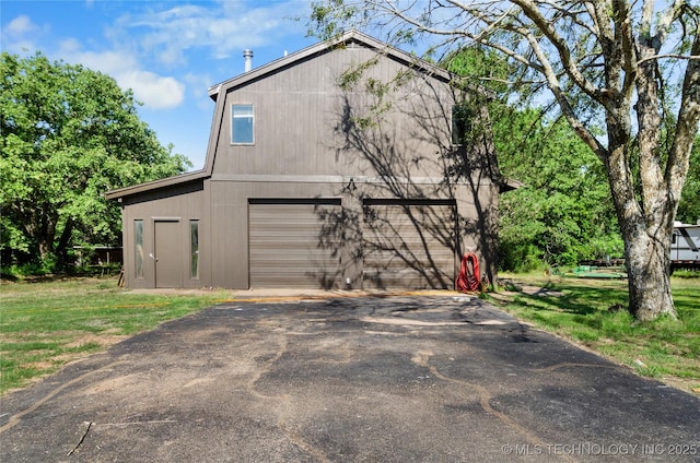 view of property exterior featuring a garage