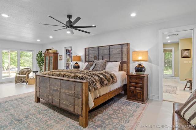 bedroom with a textured ceiling, ceiling fan, and ornamental molding