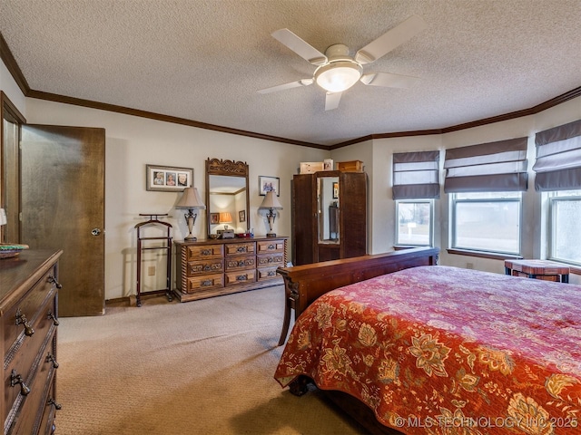 bedroom featuring a textured ceiling, light colored carpet, ceiling fan, and ornamental molding