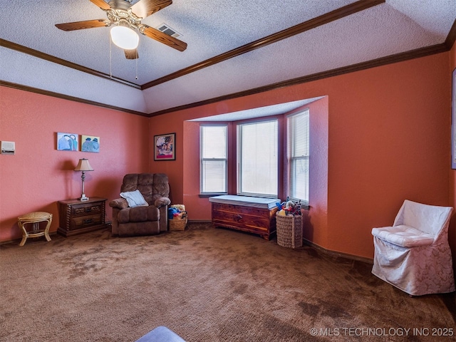 living area with a textured ceiling, dark colored carpet, lofted ceiling, and ornamental molding