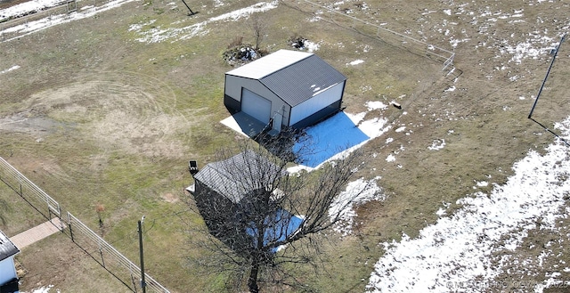 birds eye view of property featuring a rural view