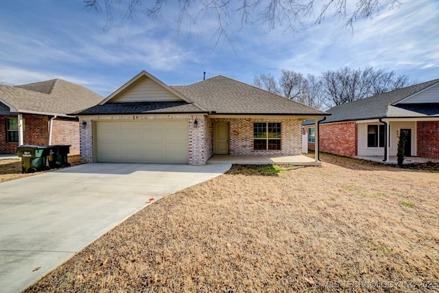 single story home featuring a garage