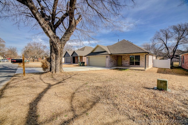 ranch-style house featuring a garage