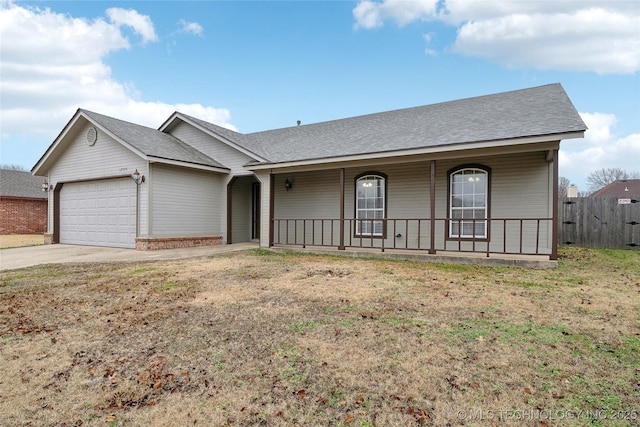 ranch-style house with a front lawn, a porch, and a garage