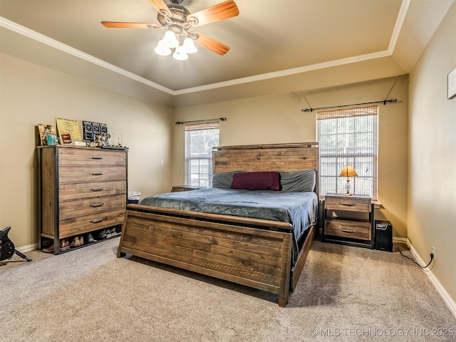 bedroom featuring multiple windows, ceiling fan, carpet floors, and ornamental molding