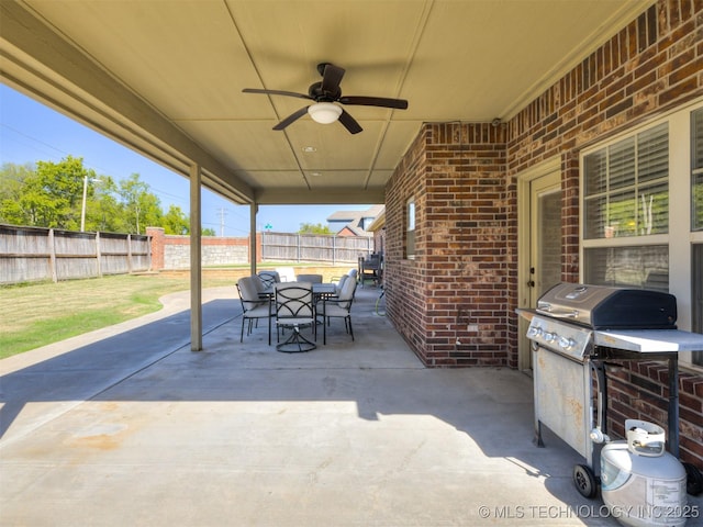 view of patio / terrace featuring a grill and ceiling fan