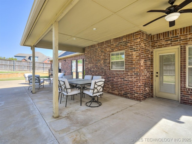 view of patio / terrace featuring ceiling fan