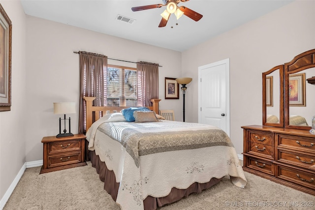 bedroom featuring ceiling fan and light carpet