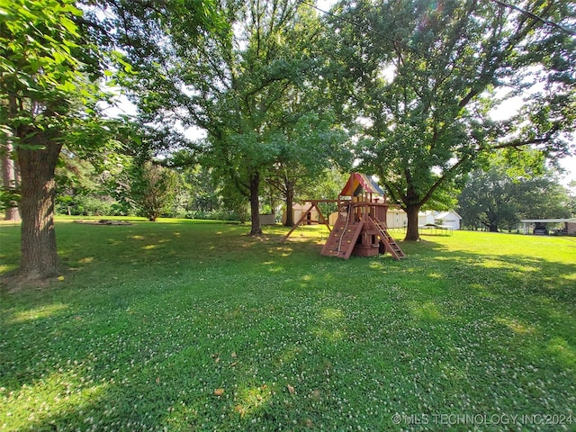 view of yard with a playground