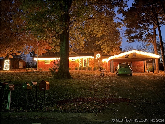 view of yard featuring a carport