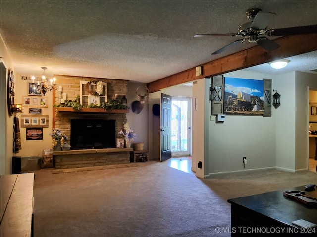 carpeted living room featuring ceiling fan with notable chandelier, a textured ceiling, and a stone fireplace