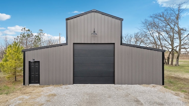 view of outbuilding featuring a garage