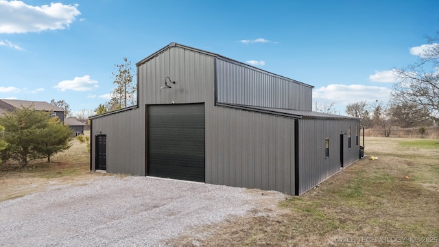 view of outbuilding with a garage