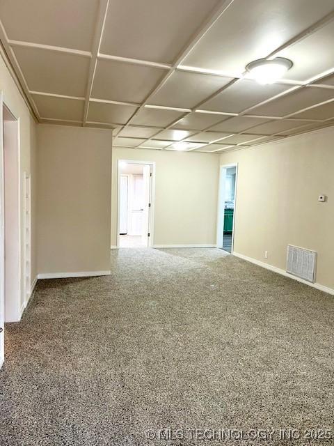 unfurnished room featuring carpet floors