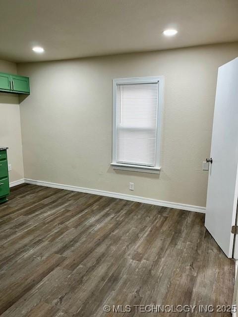 interior space with dark hardwood / wood-style floors