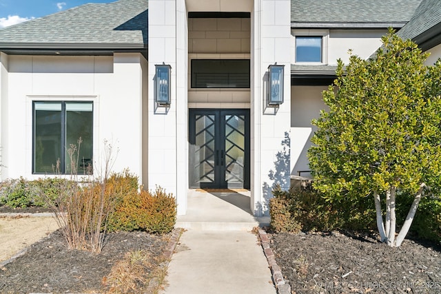 doorway to property featuring french doors