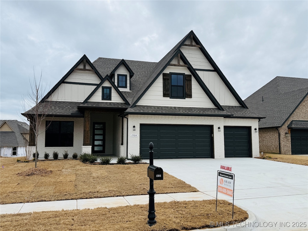 view of front of property with a garage