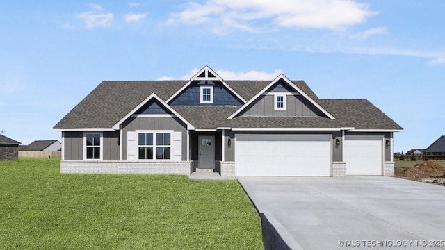 craftsman-style home with a garage and a front lawn