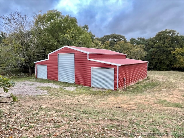 view of outdoor structure featuring a garage