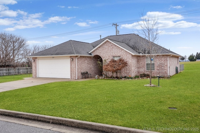 ranch-style house with a garage and a front yard