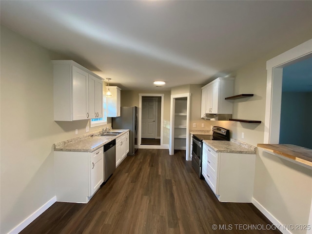 kitchen with pendant lighting, white cabinets, sink, dark hardwood / wood-style flooring, and stainless steel appliances