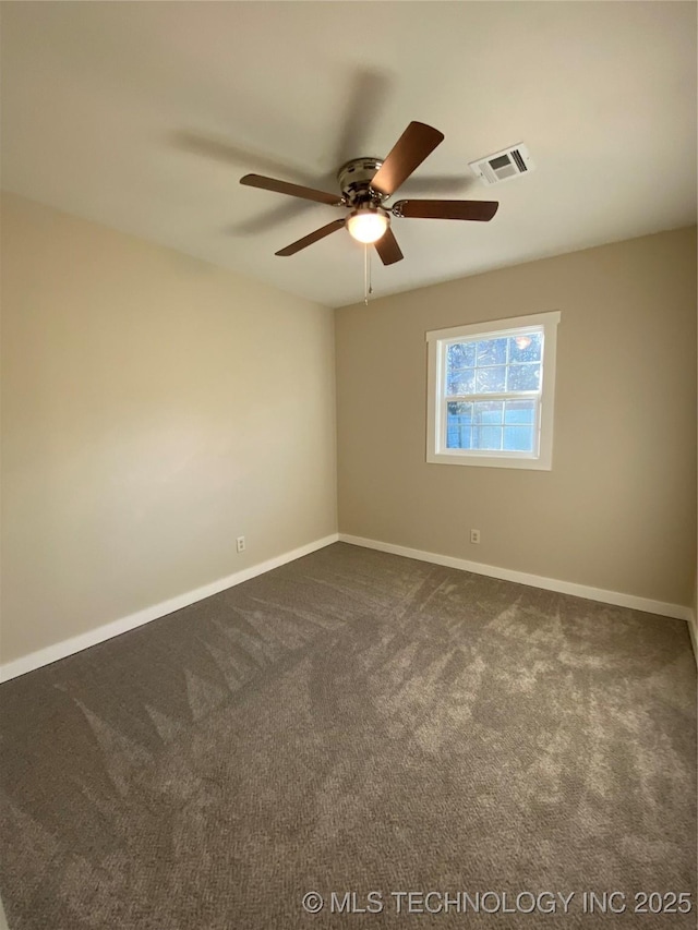 empty room featuring carpet flooring and ceiling fan