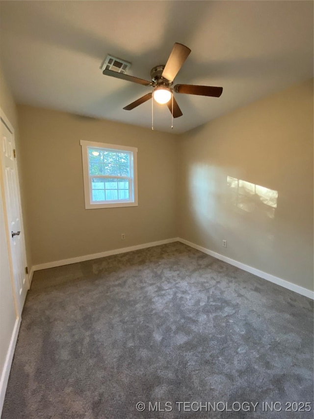 carpeted empty room with ceiling fan