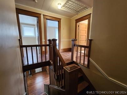 staircase with crown molding