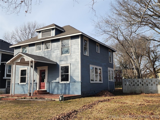 view of front of house with a front lawn