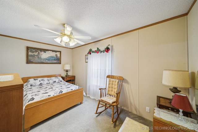 bedroom featuring carpet flooring, a textured ceiling, and ornamental molding