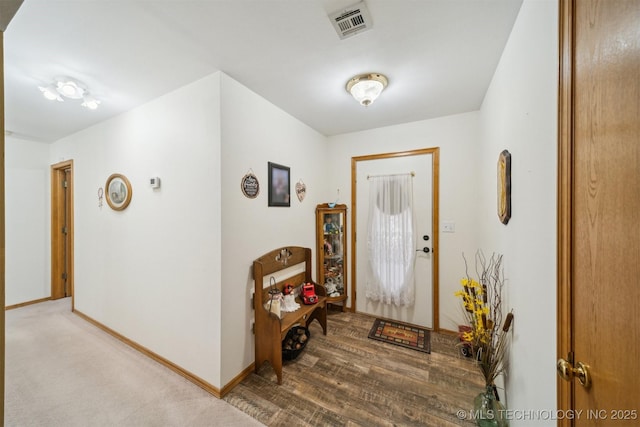 entryway with visible vents and baseboards