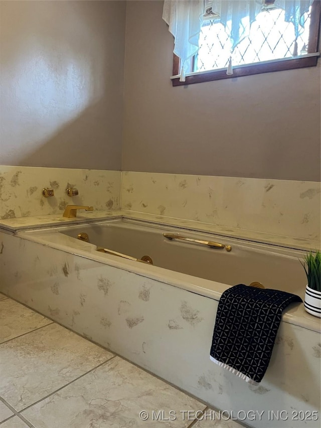 bathroom with tiled tub