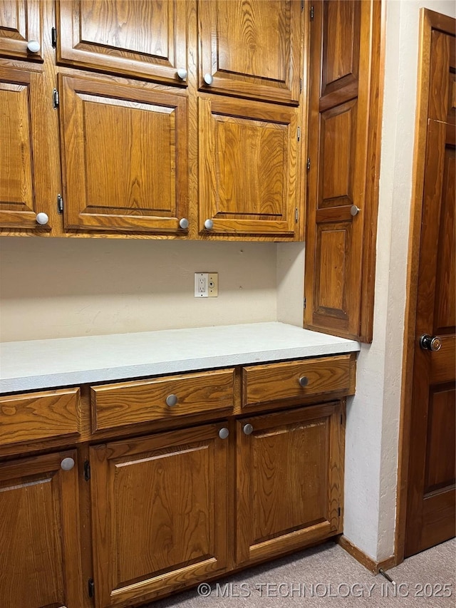 room details featuring carpet and baseboards