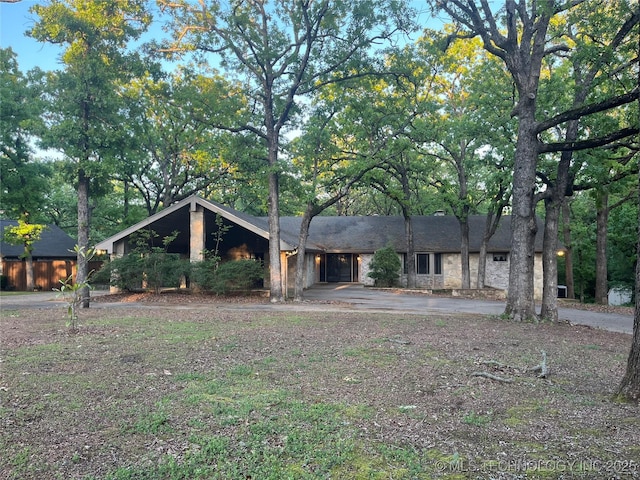 view of front of property featuring stone siding