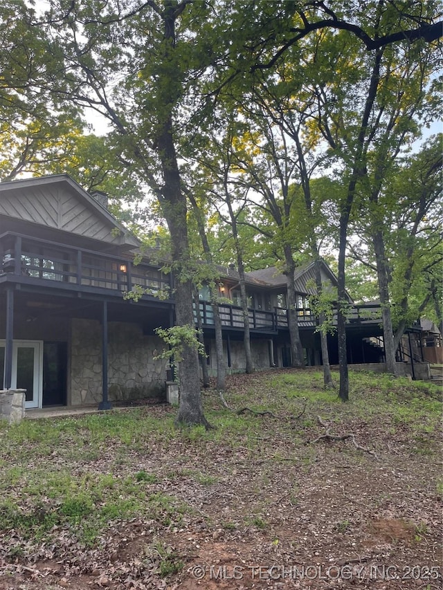 view of yard featuring a wooden deck